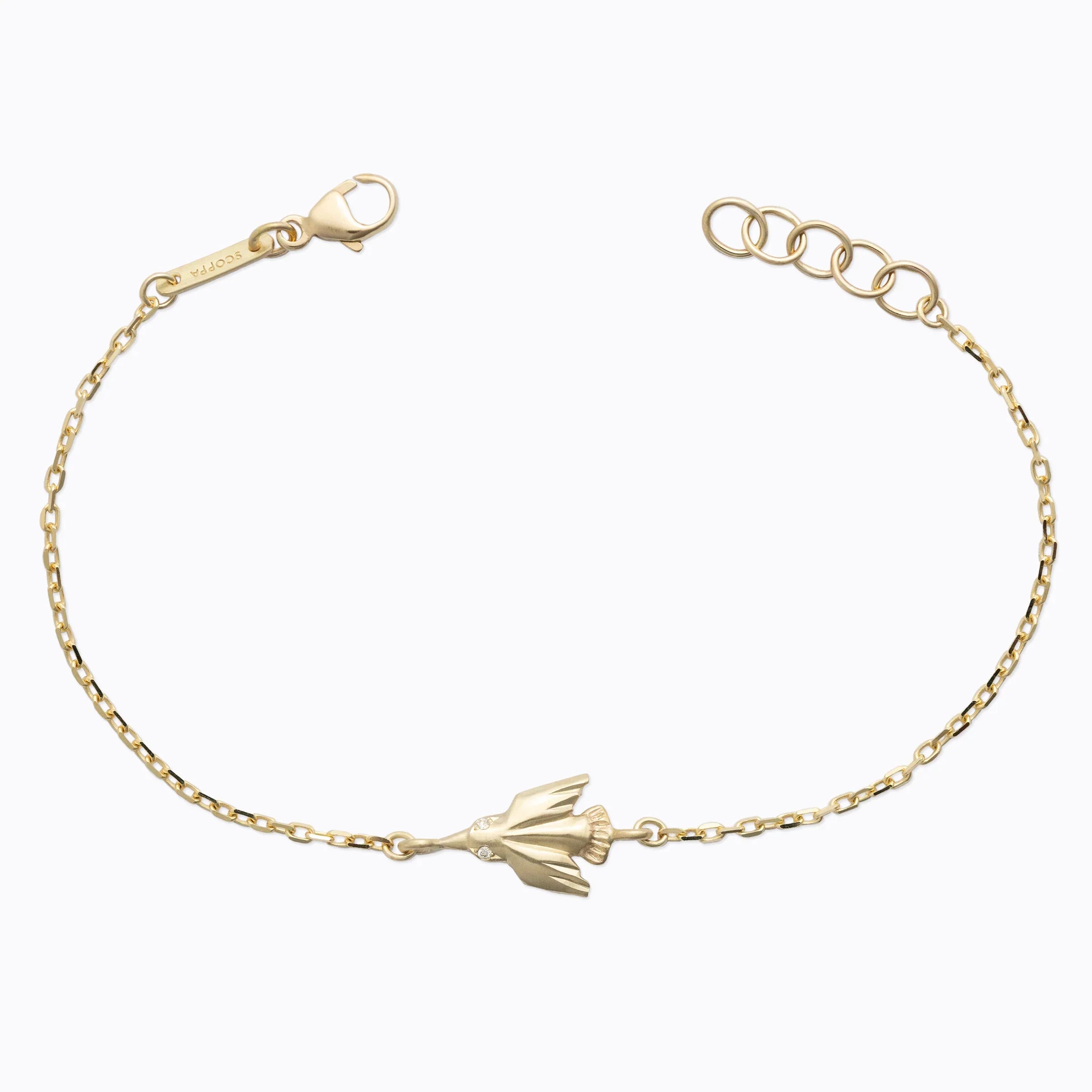 Delicate 18k yellow gold bracelet with hand-fabricated hummingbird charm and chain links