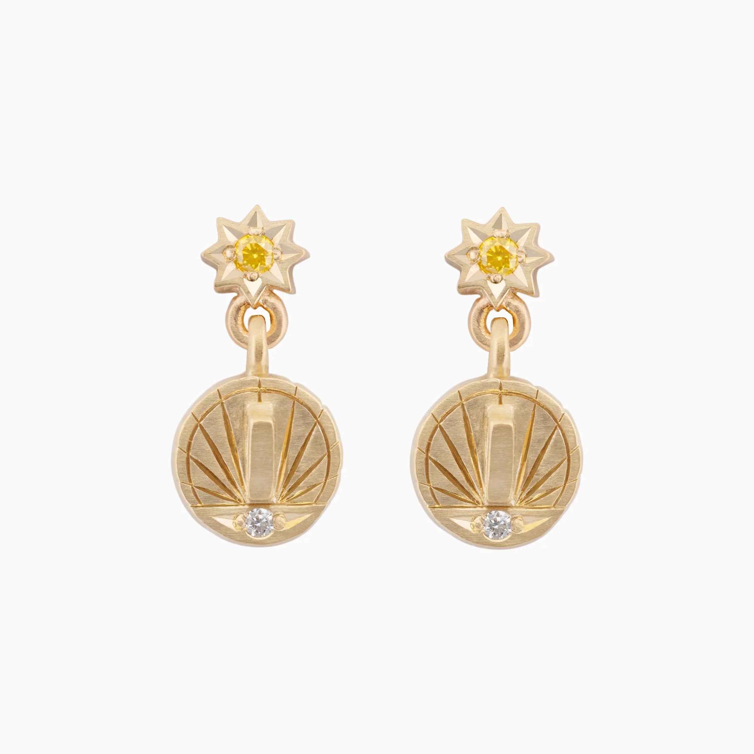 Handcrafted gold sundial earrings with yellow gemstone stars and diamond accents on white background