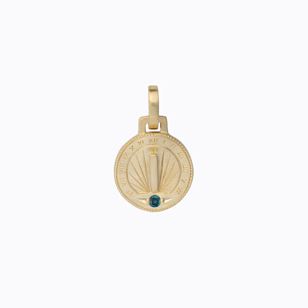 Handcrafted gold sundial pendant with hand-engraved Roman numerals and teal gemstone, clean white background
