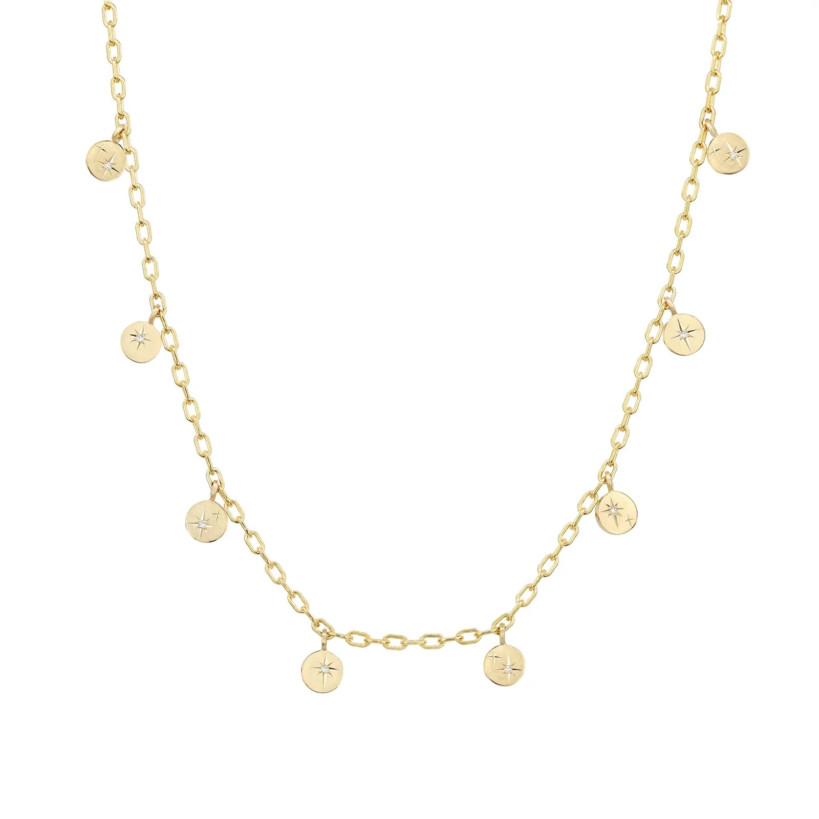 Delicate 14k yellow gold chain necklace with small hand-engraved starburst pendants and diamond accents