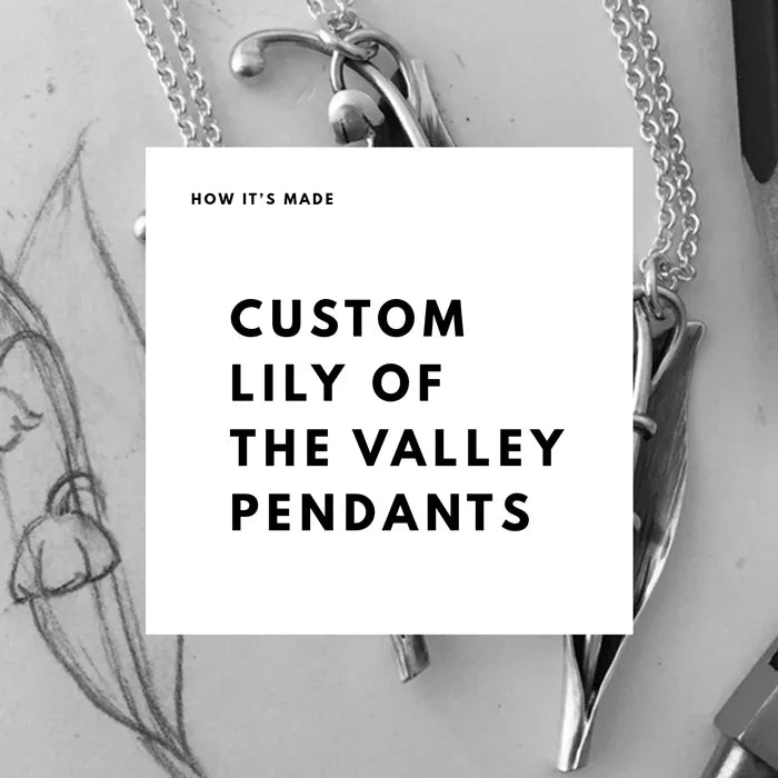 Black and white image showing custom lily of the valley silver pendants on sketch background with delicate chain